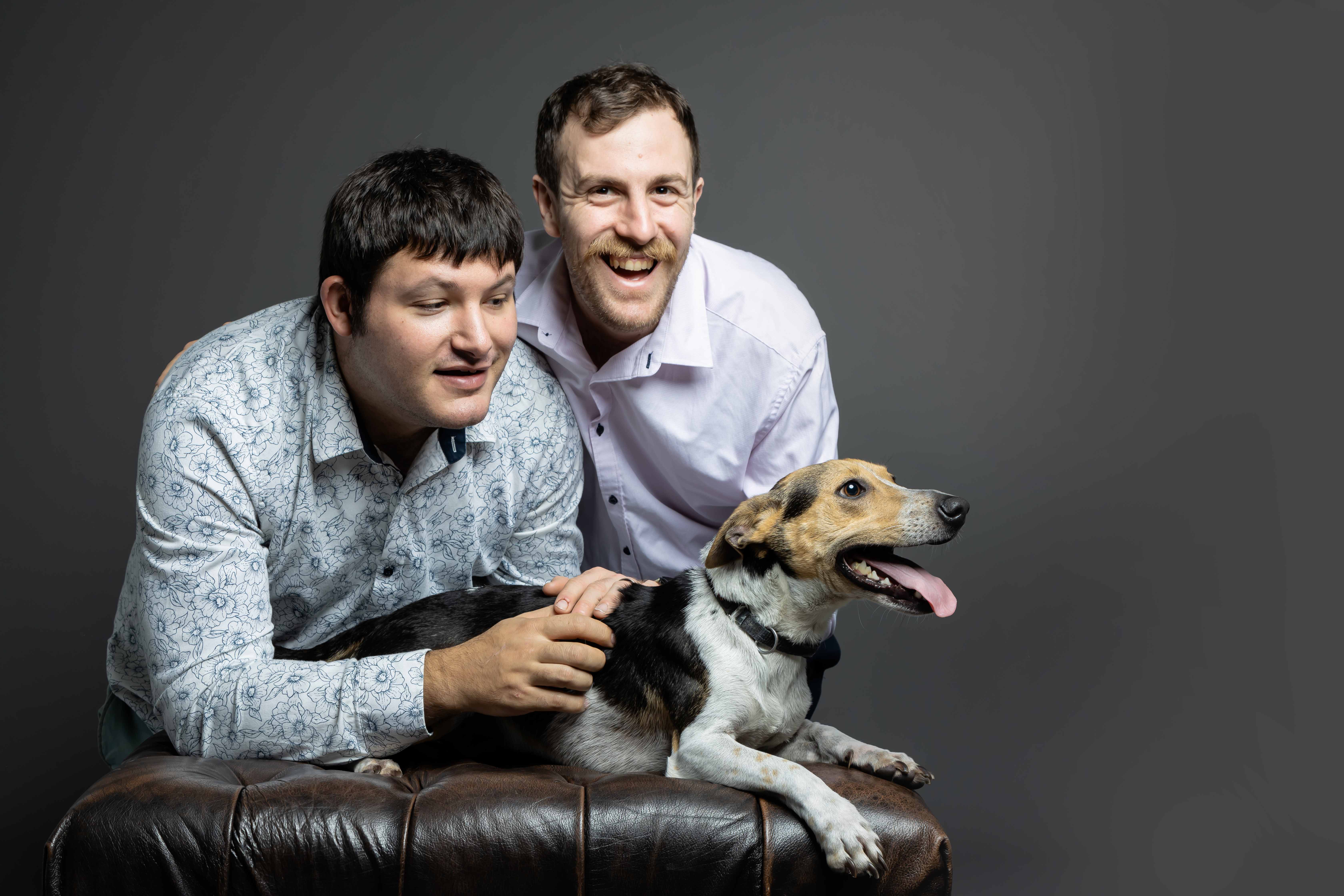 Eden, his husband, and Collin - The PawBuddy family